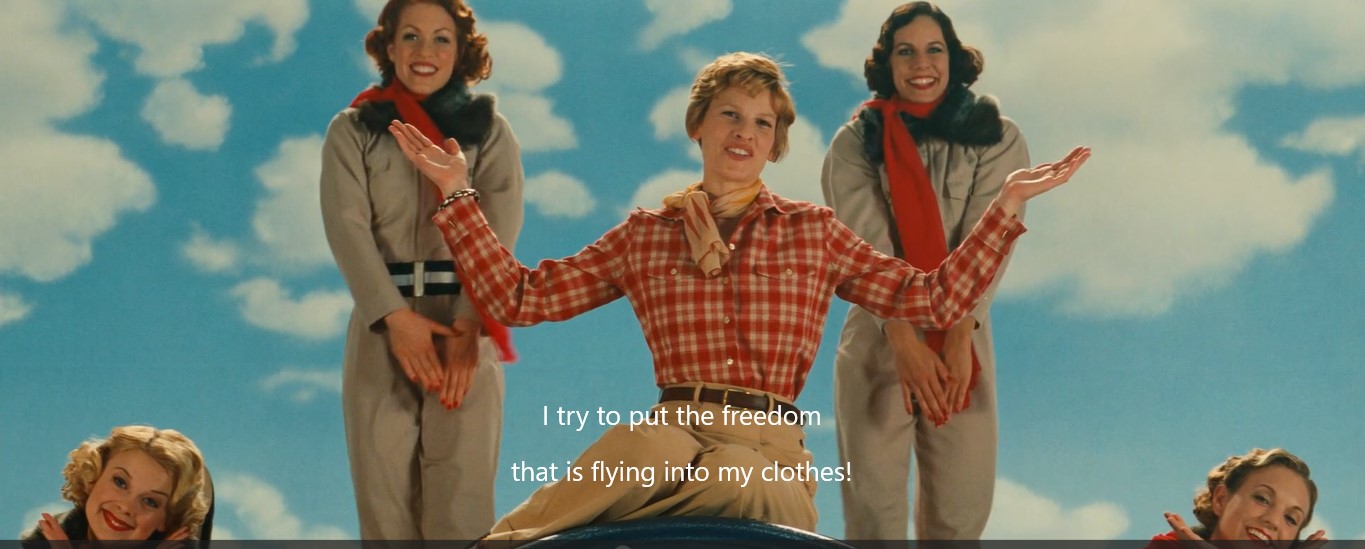 Amelia Earheart (Hilary Swank) improvise sur fond de ciel une chorégraphie avec des aviatrices; elle déclare: "j'essaye d'apporter la liberté qui vole dans mes vêtements".